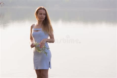 A Girl By The Water Under An Old Oak Tree Stock Image Image Of Love