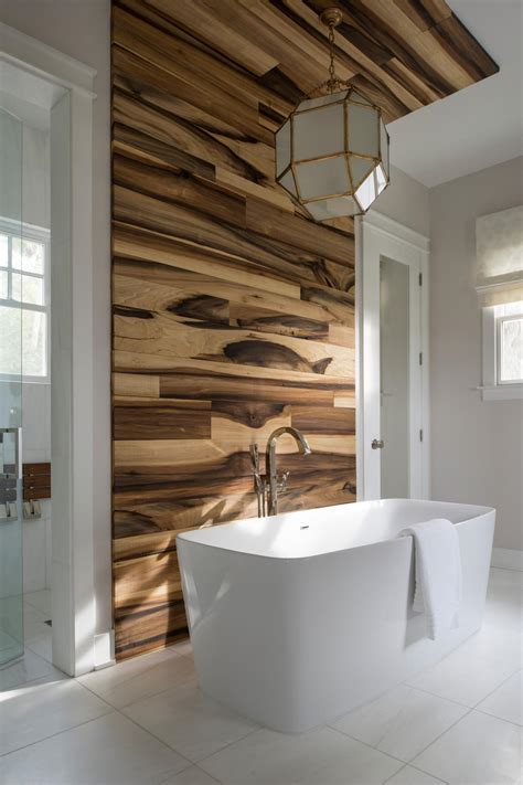 All glazed tiles are waterproof, and the permanent installation means your walls and backsplashes will stay safe and. Modern Bathroom With Wood Accent Wall and Hexagon ...