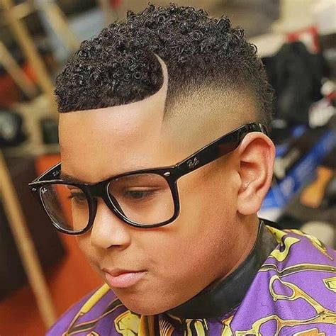Whether you're getting your kids haircut at a local barbershop or salon, these are the most high skin fade with part and curly top. 60 Easy Ideas for Black Boy Haircuts - (For 2020 Gentlemen) in 2020 | Black boys haircuts, Cool ...