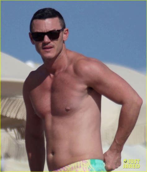 Luke Evans Shows Off Nipple Piercings While Shirtless In Miami Photo