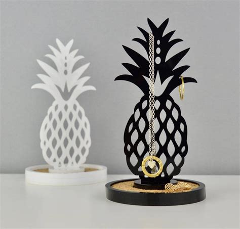 These cork holders are the best ways to show your love of wine. Pineapple Ring Stand Jewellery Holder in Black or White ...