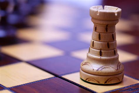 White Chess Piece On Top Of Chess Board · Free Stock Photo