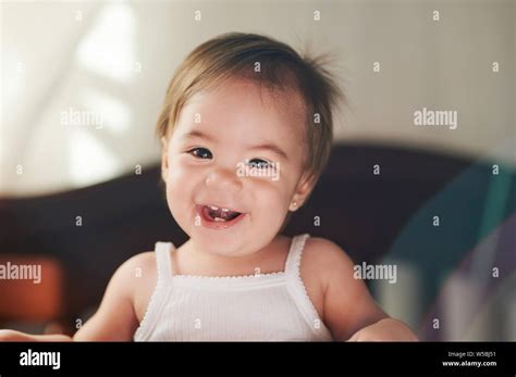 Happy Smile Baby Girl In White T Shirt Portrait Stock Photo Alamy