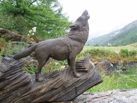 Woodcarver Wolf Howling 1 In Bog Oak By Woodcarve Animal Sculptures