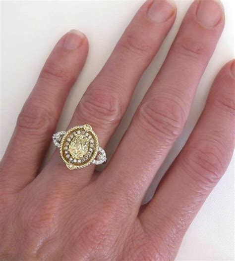 Daniella loves the idea of jewellery that has been buried for thousands of years and creates pieces with a similar charm and character, this is her. Unheated Natural Oval Yellow Sapphire Ring with White ...