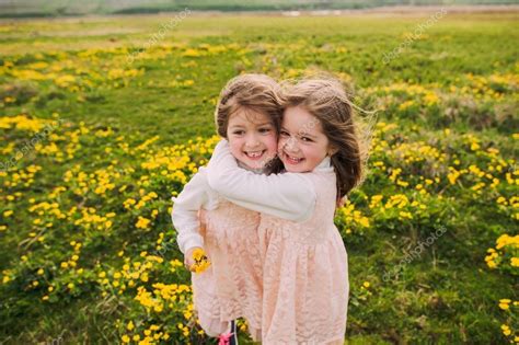 Cute Twin Sisters Stock Photo By ©photolife 107231068