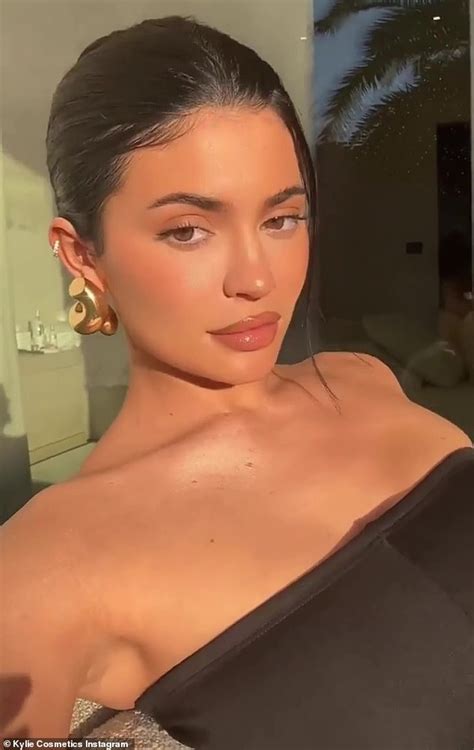 Kylie Jenner Looks Stunning In A Strapless Top As She Plugs Her Kylie Cosmetics Summer Staples