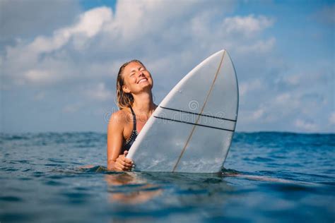 Smiled Surfer Woman With Surfboard Woman With Surfboard In Ocean Stock Image Image Of Person