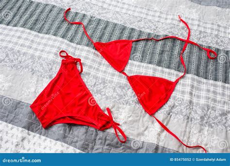 Red Bikini On The Bed Stock Photo Image Of Idyllic Vertical 85475052