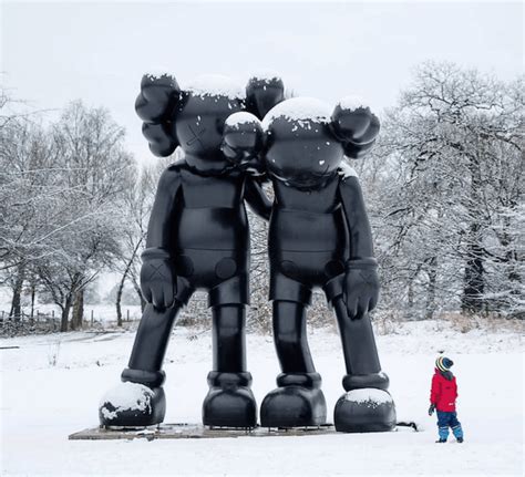 Giant Statues Of Kaws Popular Figures Make Their Debut At Yorkshire
