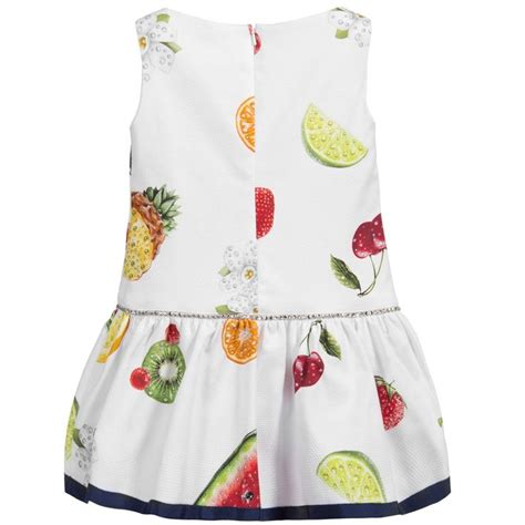 White Sleeveless Dress By Monnalisa With An All Over Tropical Fruits Print The Dropped Waist