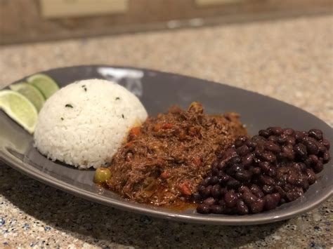 Homemade Ropa Vieja Cilantro White Rice And Black Beans With