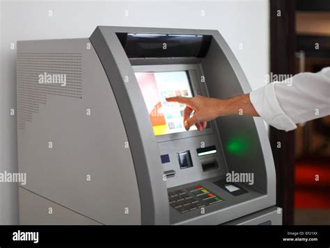 Man using banking machine. Close up Stock Photo - Alamy