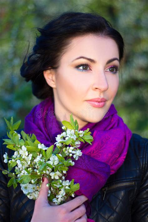 Close Up Portrait Of Beautiful Woman With Cherry Tree Flowers Stock