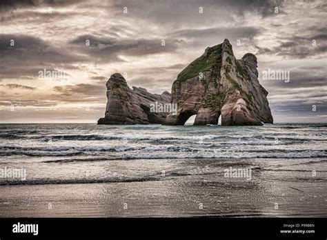 The Archway Islands Off Wharariki Beach At The Northern Tip Of New Zealand S South Island Stock