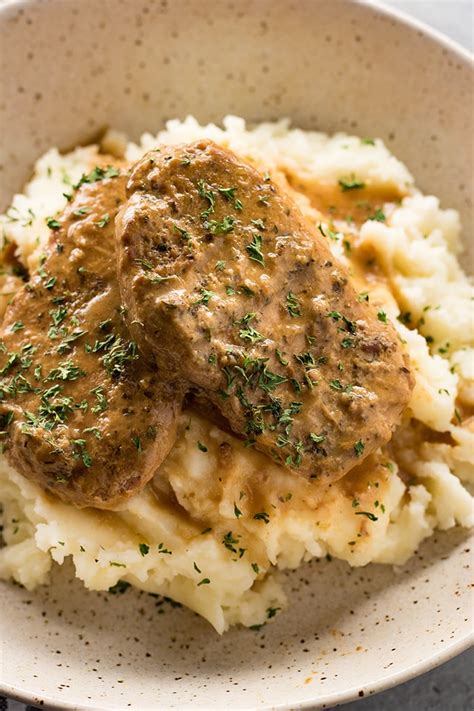 Pour the chicken broth on top of pork chops. Slow Cooker Pork Chops - The Salty Marshmallow