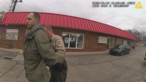 Body cam footage shows arrest of tattoo parlor murder suspect - YouTube