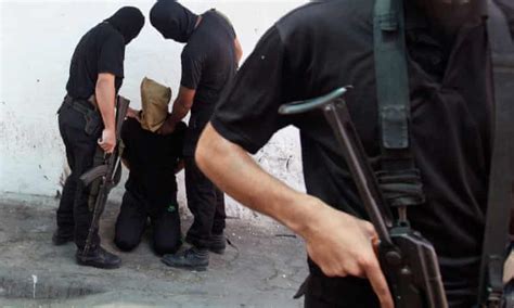 Hamas Executed 23 Palestinians Under Cover Of Gaza Conflict Says Amnesty Hamas The Guardian