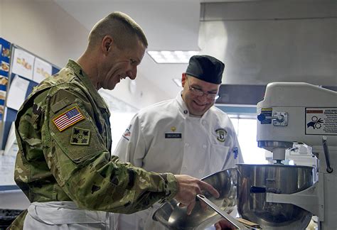 Sgt Maj Of The Army Daniel A Dailey Prepares A Meal With Spc