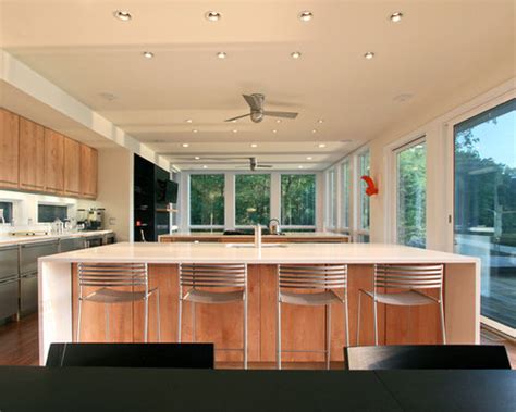 Creating a recessed kitchen corner cabinet with a sink. Lake House Interior | Houzz