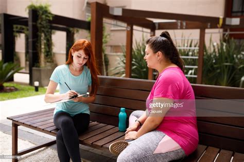 Personal Trainer Instructing Her Client High Res Stock Photo Getty Images