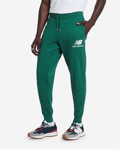 Shop New Balance Essential Stacked Logo Sweatpants Mp03558 Tfn Green