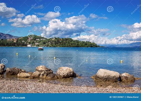 Beautiful Idyllic Summer Landscape With Calm Sea Boat Blue Sky And