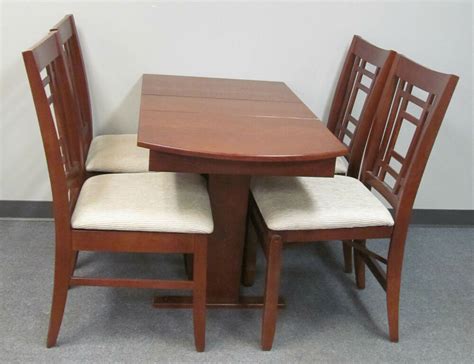 This folding table and chairs set folds flat for easy storage. RV Hide Leaf Dinette Table Folding Slat Storage Chairs ...