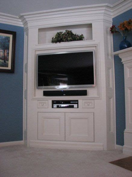 Ask us to design and install built in tv cabinets for flat screen tv systems for instance. corner entertainment center plans | corner entertainment ...