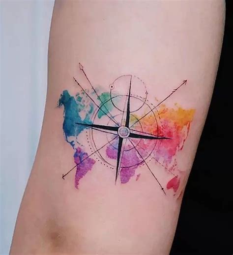 A Colorful Watercolor Tattoo With A Compass And World Map On The Right