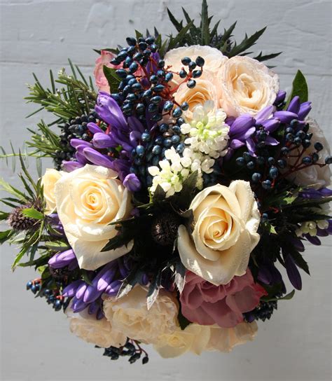 The Flower Magician Winter Wedding Bouquet To Tone With Blue