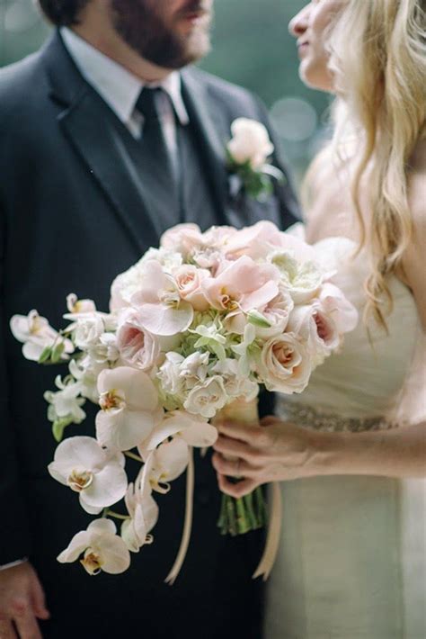 Romantic Cascading Wedding Bouquet With White Orchids And Blush Flowers