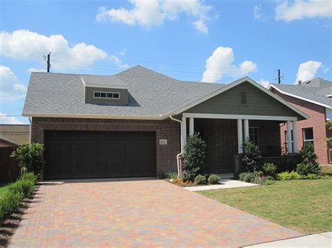 Black door, black shutters, white door trim (a classic look). The Crawford (1763-C) Plan | Red brick house, Black garage ...