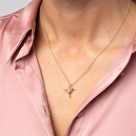 Nine Carat Gold Hummingbird Necklace With Sapphire By Lily Charmed