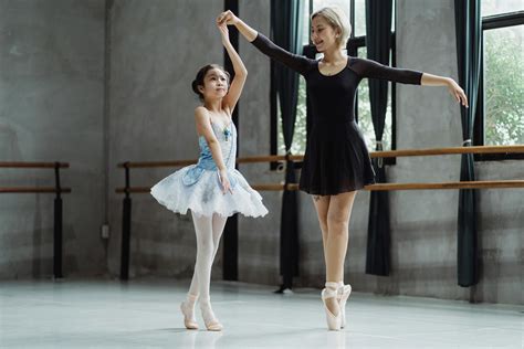 Ballet Teacher Dancing With Girl · Free Stock Photo