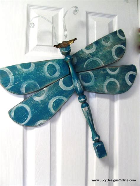 Dragonfly made from ceiling fan blades and table leg. Pin on Crafty so-and-so