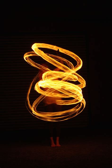 Model With Fire Poi Slow Shutter Speed Elements Light Liquid Heat