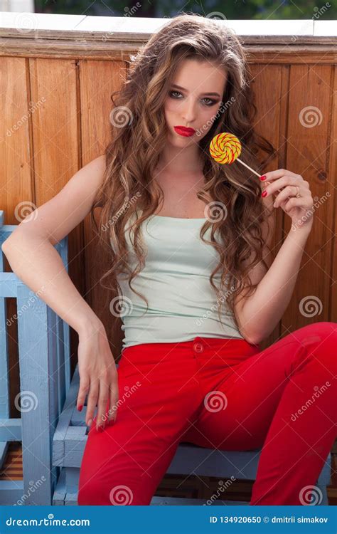 Beautiful Woman Eats Sweet Candy Lollipop Sweets Tasty Stock Photo
