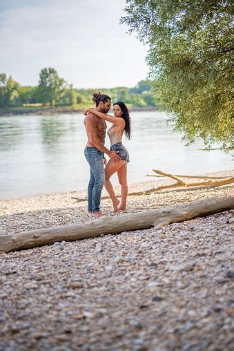 Beautiful Couple At The Beach Of Danube River In Austria Bearded Guy With His Girlfriend Arm In