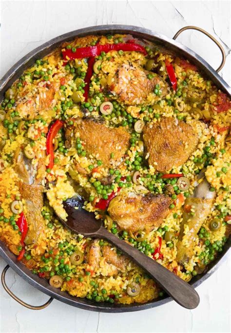Arroz con pollo is a staple all across latin america, and one country's variation can be vastly different from another's. Arroz con pollo: Spanish Chicken with rice - David Lebovitz