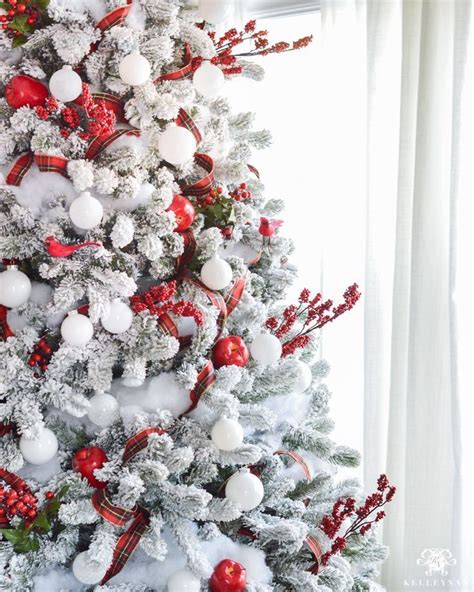 Flocked Snow Covered Christmas Tree With Red Berries Apples And Birds