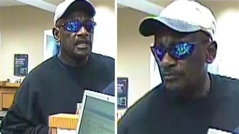 fbi robber holds bank tellers at gunpoint while demanding cash abc13 houston