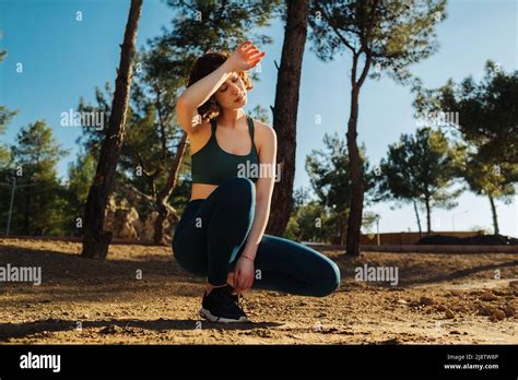 Young Beautiful And Attractive Sport Redhead Woman In Runner Sportswear