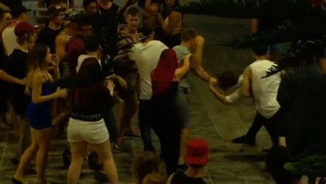 26 Teenagers In Handcuffs After Fight Erupts At Schoolies Daily Mail