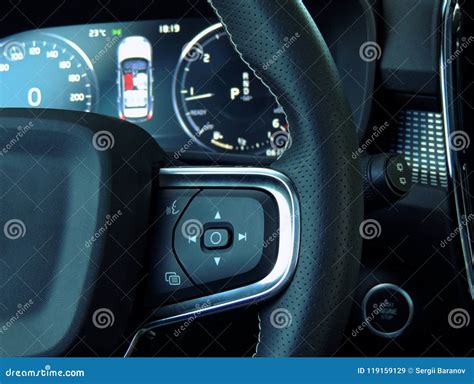 Menu Interface And Voice Control Buttons On The Steering Wheel In Car