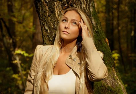 Beautiful Blond Woman Portrait In The Forest With Birch Tree Stock