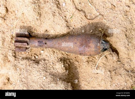 Old Unexploded Mortar Shell Grenade On The Sand Stock Photo Alamy