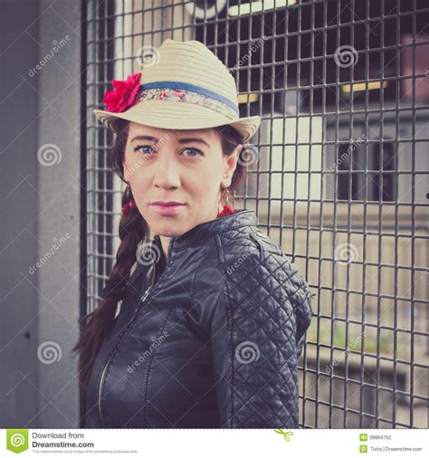 Pretty Girl With Hat And Leather Jacket Posing Stock Photo Image Of