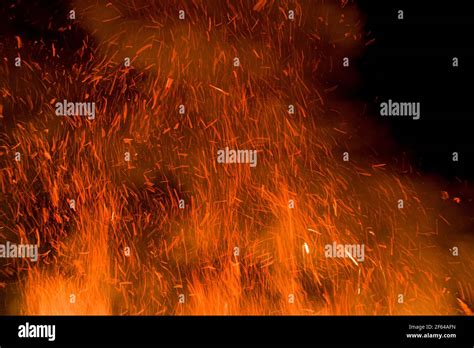 Embers Rise Into The Air Above The Flames Stock Photo Alamy