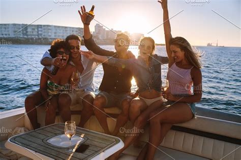 Woman Enjoying A Boat Party High Quality People Images ~ Creative Market
